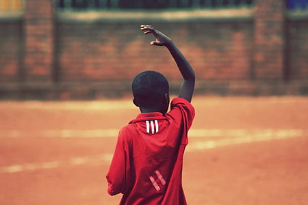 boy in red shirt raising his hand thumbnail