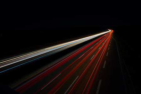 time-lapse photo of red and white light streaks thumbnail