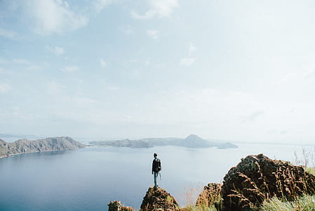 man standing on cliff thumbnail