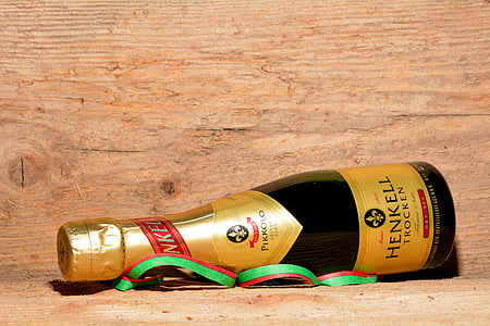 Henkell Frocken bottle lying on brown wooden surface thumbnail