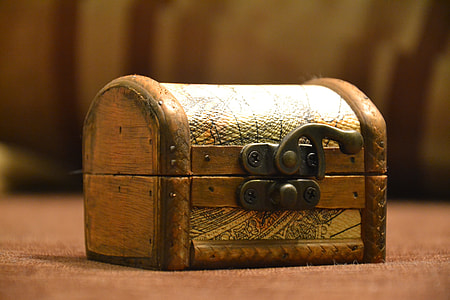 selective focus photography of beige jewelry chest thumbnail