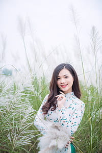 Photography of Woman Wearing Long-sleeve Dress thumbnail