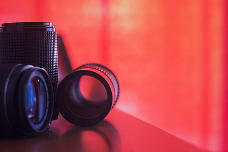 DSLR camera on table with two lens thumbnail