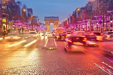 Night view of Arc de Triomphe with vehicle light trails effect thumbnail