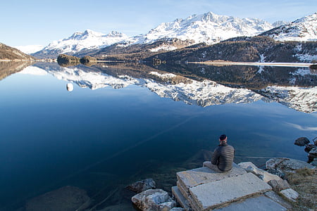 man sitting on cliff thumbnail