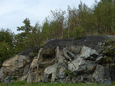 Blackened rocks in Sudbury in Ontario, Canada thumbnail