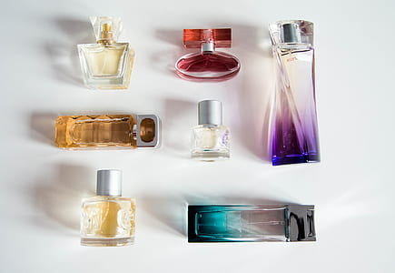 flat-lay photography of fragrance bottle lot thumbnail