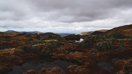 aerial photography of water formation around mountains thumbnail