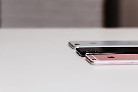rose gold iPhone 6s, space gray iPhone X, and silver iPhone 7 thumbnail