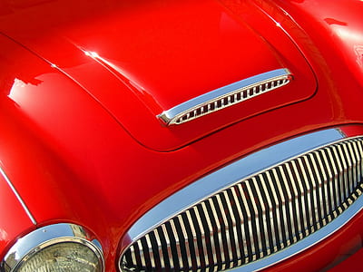 close-up photography of red vehicle thumbnail