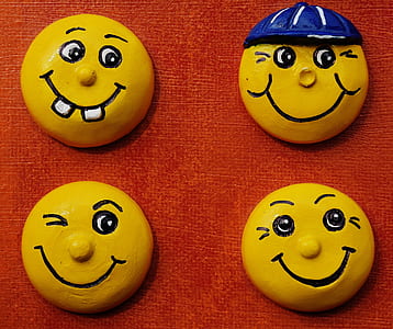 four yellow smiley face character models thumbnail