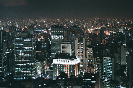 city building during night-time thumbnail