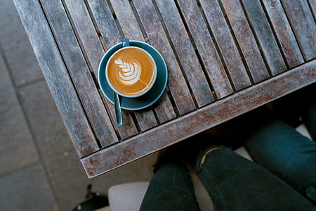 cappuccino on blue ceramic saucer thumbnail