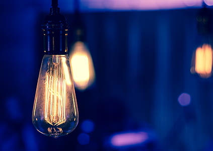 selective focus photography of lighted light bulb thumbnail