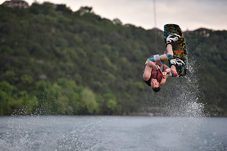 man wakeboarding on water thumbnail