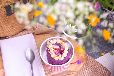 white icing covered cake in ceramic bowl thumbnail