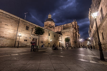 people standing beside cathedral thumbnail