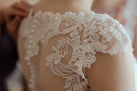 woman wearing white floral top thumbnail