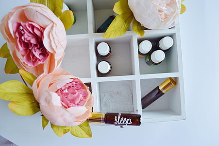photography of pink flowers on white organizer thumbnail