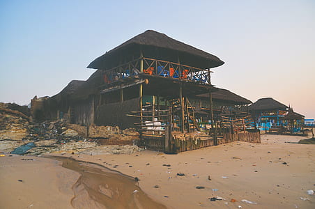 brown 2-storey nipa hut on beach thumbnail