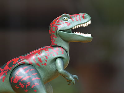 close up of gray and red dinosaur action figure thumbnail
