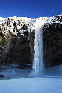 waterfalls during snow time-lapse photography thumbnail