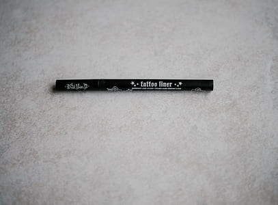 tattoo liner on white textile thumbnail