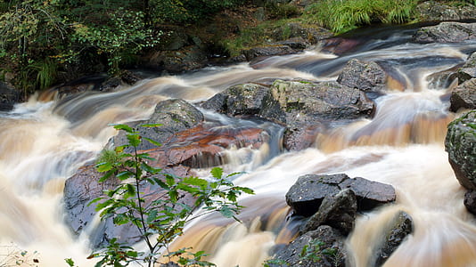 silk water photography of waterfalls thumbnail