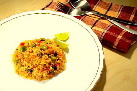 close-up photography of rice toppings on white ceramic plate thumbnail