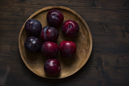 red apples on brown plate thumbnail