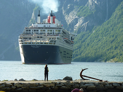 person looking at cruise ship during daytime thumbnail