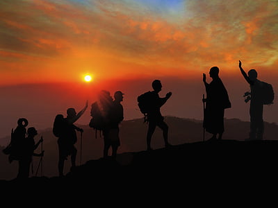 silhouette of people climbing mountain thumbnail