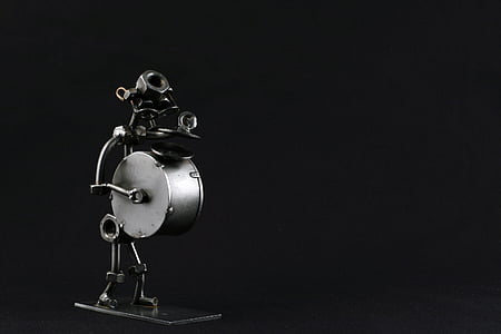 black and gray metal drum robot toy thumbnail