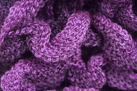 shallow focus photography of purple knit textile thumbnail