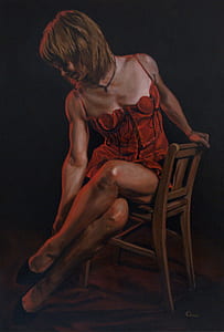 woman sitting on chair thumbnail