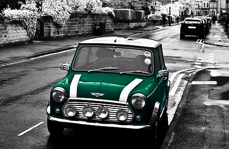 selective photo of green and white Mini Cooper 3-door hatchback parked on road thumbnail