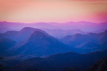 purple and pink mountains digital wallpaper thumbnail