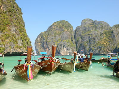 people on wooden boat thumbnail