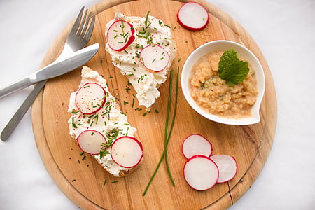 photo of cooked dish on brown serving tray with silverware thumbnail