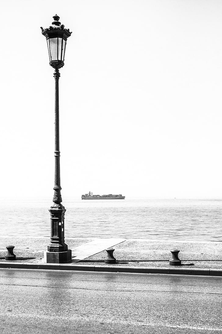 black lantern on seawall