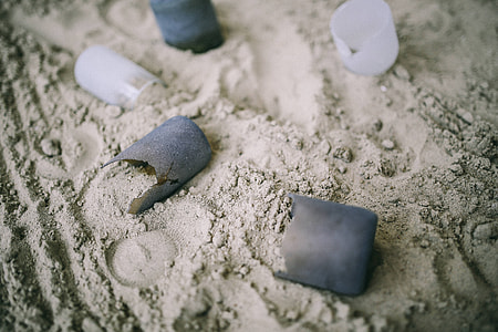 Various things in the beach sand thumbnail