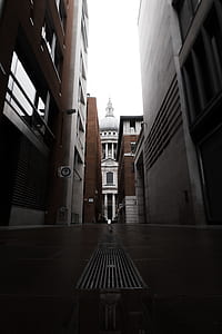photo of road between buildings photo of road between buildings thumbnail