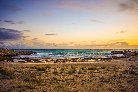 body of water during golden hour thumbnail
