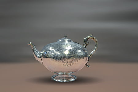 macro shot of stainless steel teapot thumbnail
