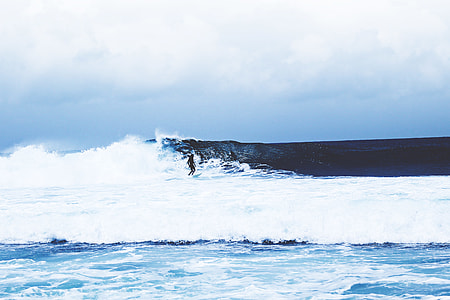 person surfing on waves thumbnail