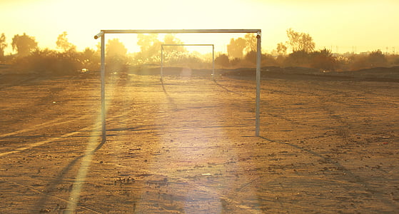 white metal goal net frames outdoors thumbnail