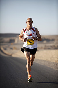 Runner training on the road thumbnail