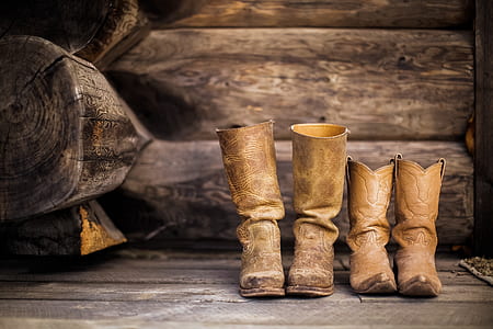 pairs of brown leather boots thumbnail