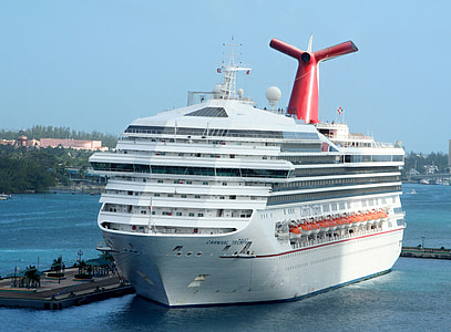 white and red cruise ship on dock thumbnail