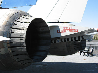 white aircraft turbine on airport thumbnail